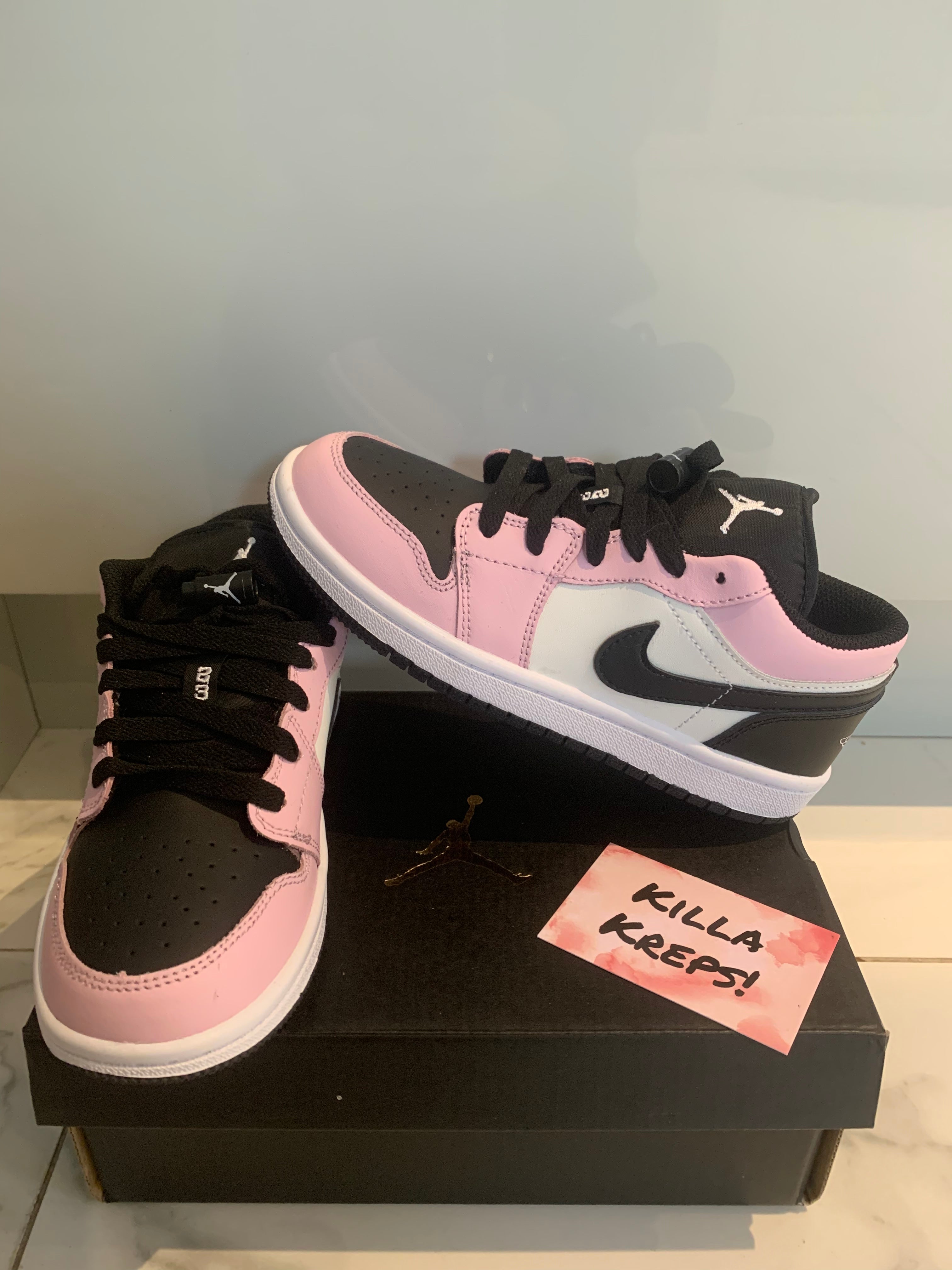 Kids pink and black 2025 jordans