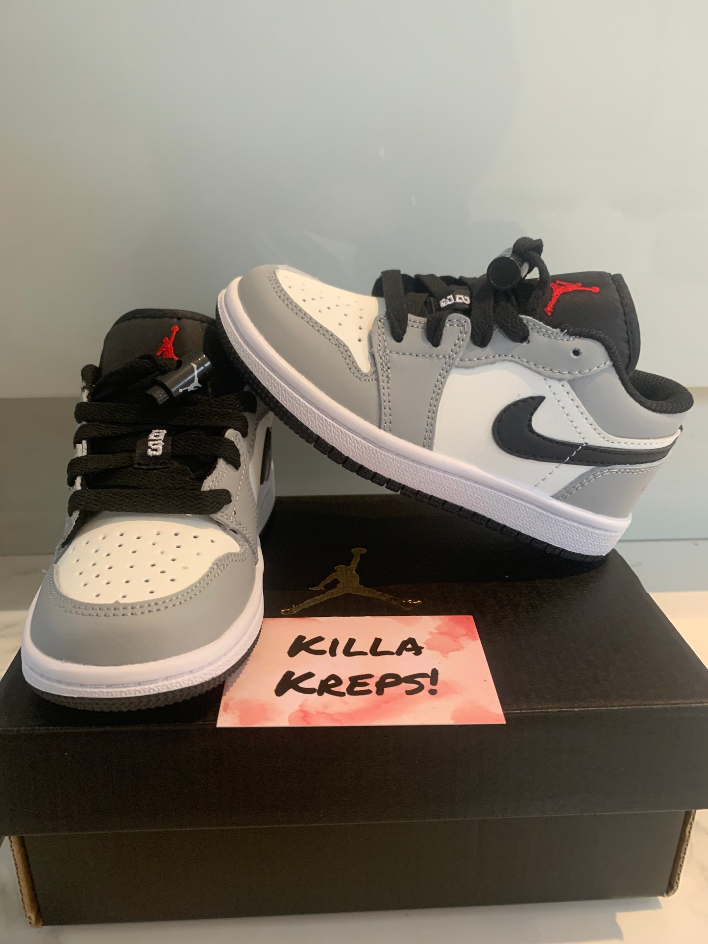 Kids grey and white j1 low