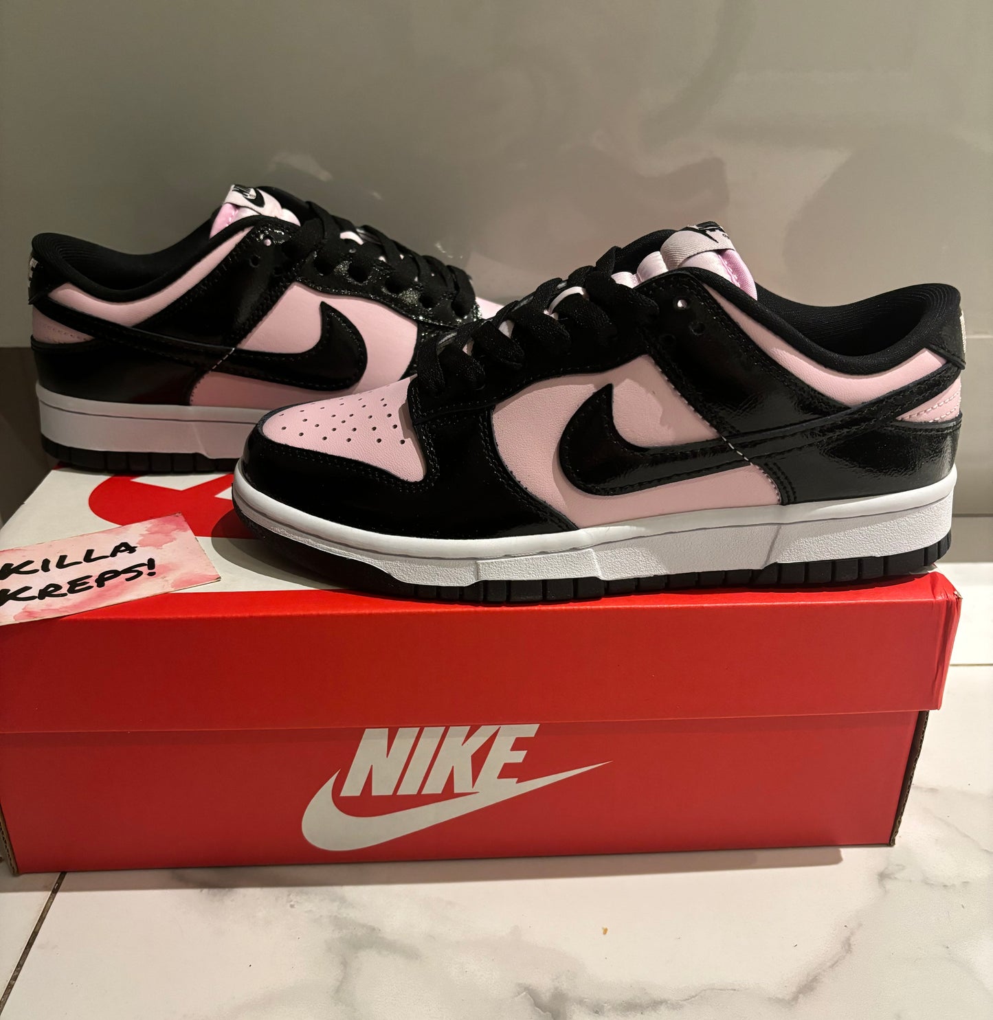 Pink Foam / Black Low Dunks