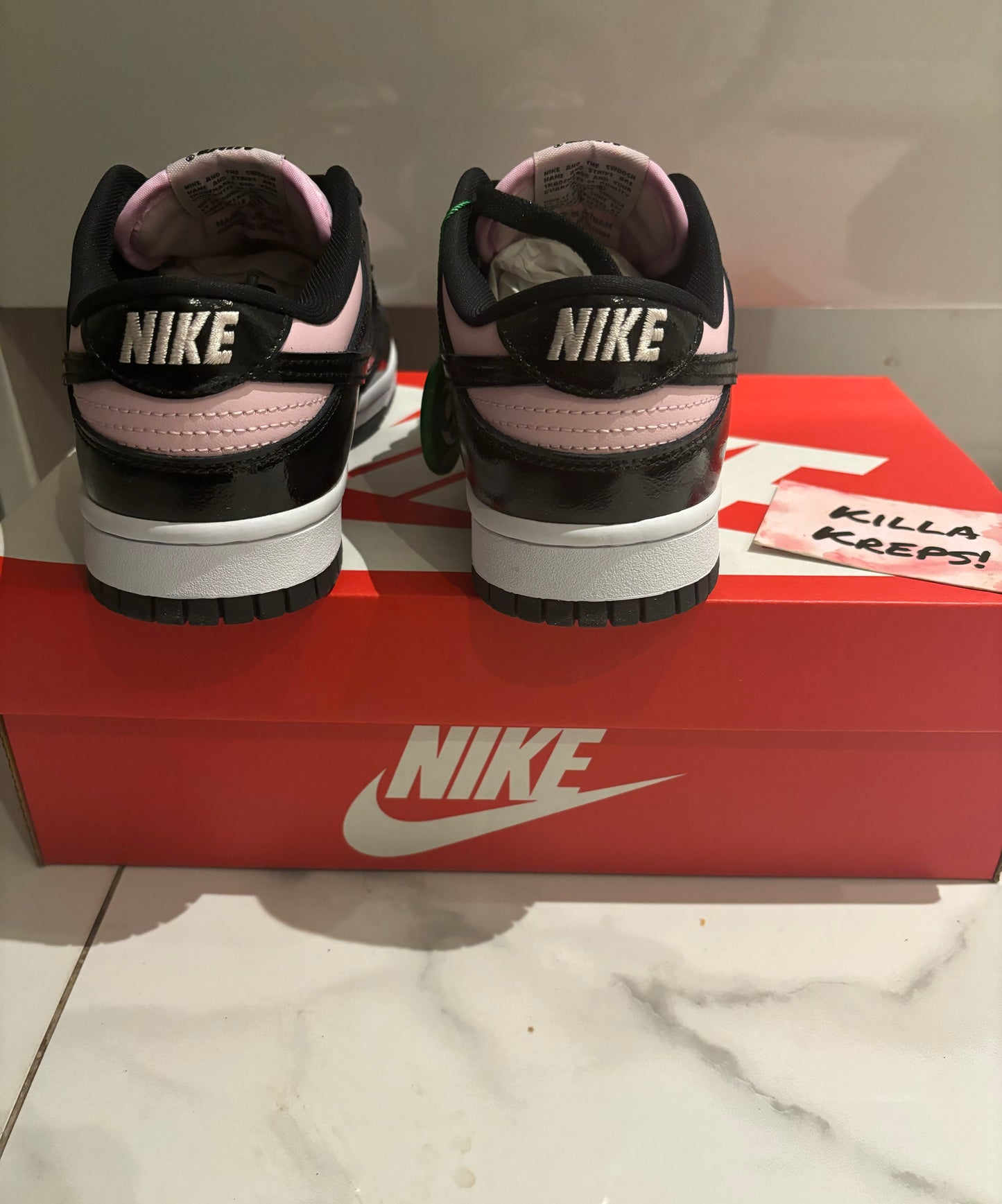 Pink Foam / Black Low Dunks