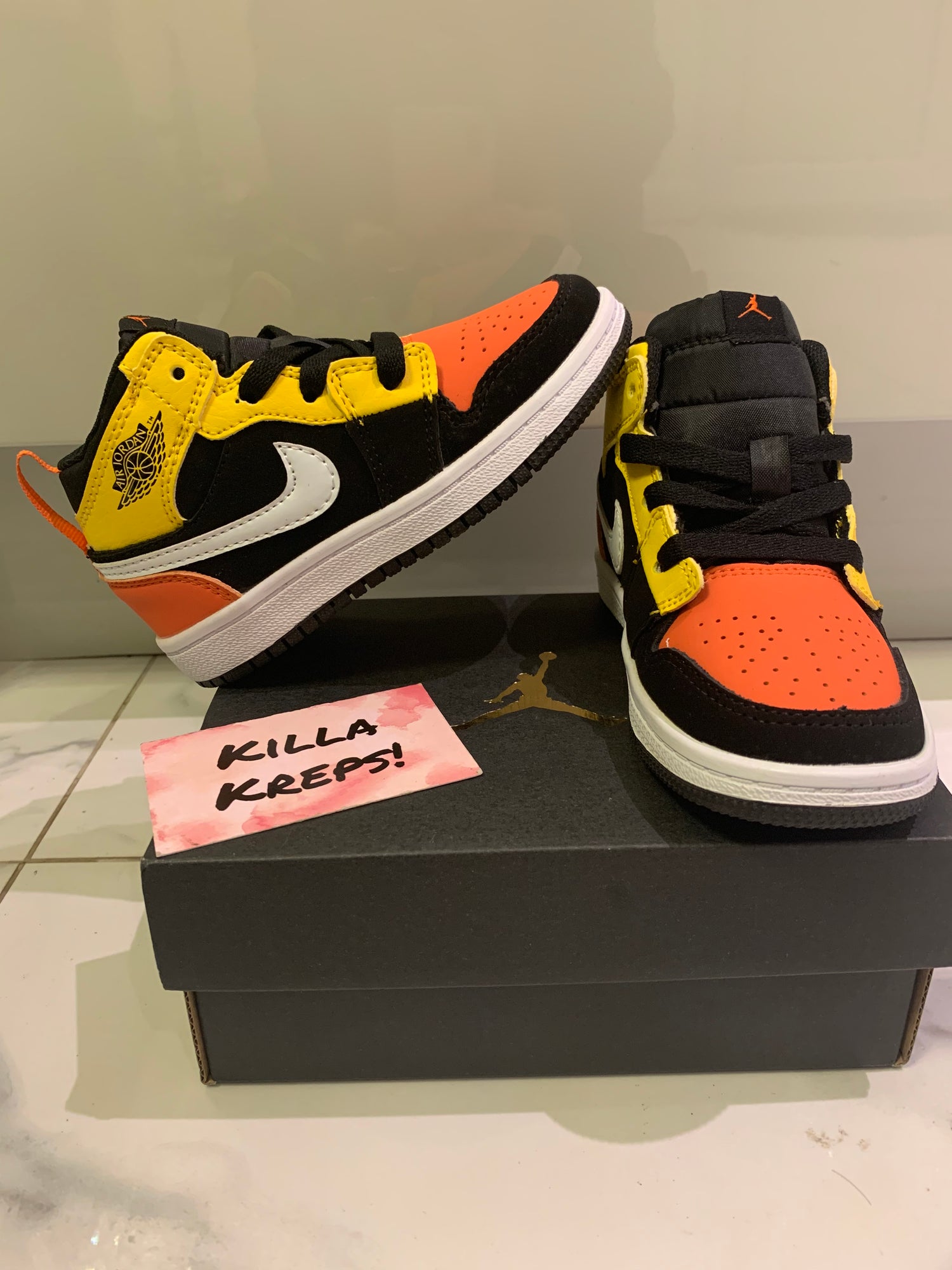 Orange and hot sale yellow jordans